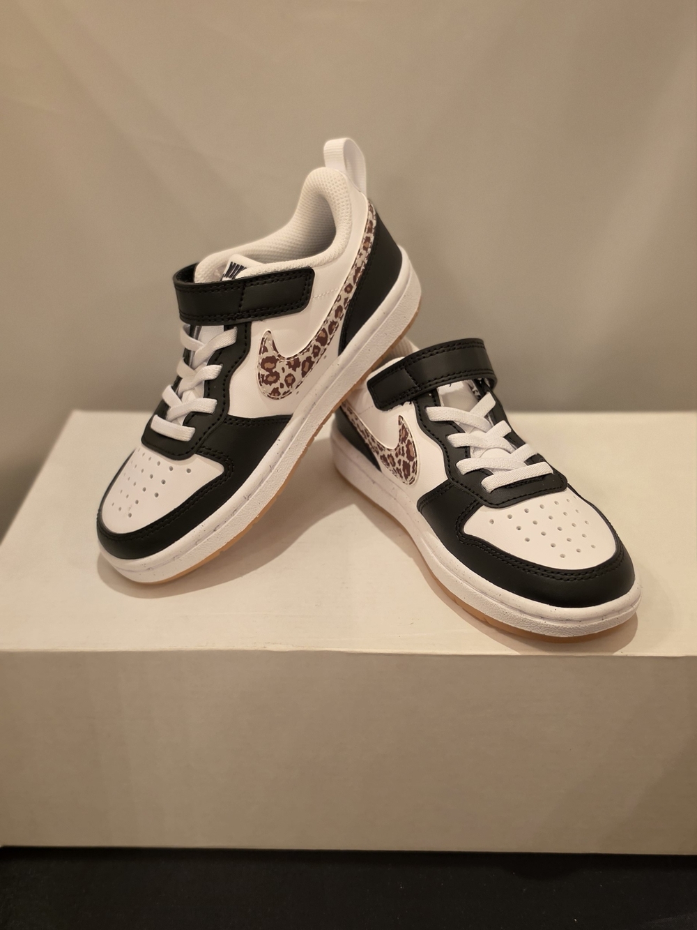 Nike Kids Black and White Sneakers with Leopard Swoosh